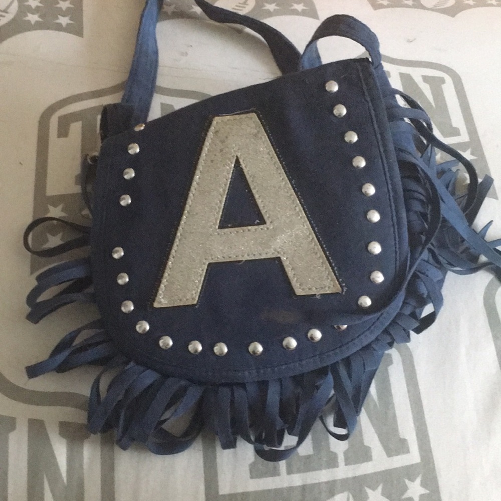 Purse with the letter A on it